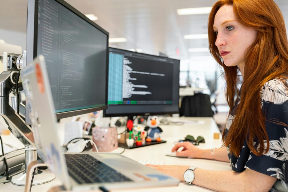 Executive Assistant working on a remote job through SwiftLogix.net